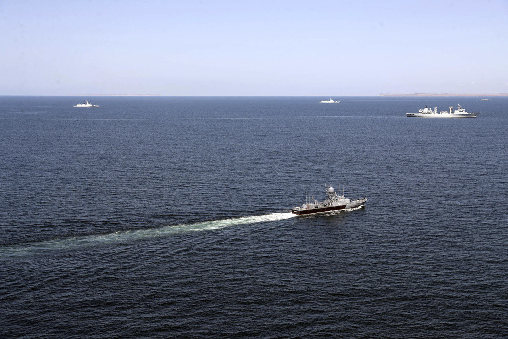 Warships enter the Iranian waters prior to the start of a joint naval drill of Iran, Russia and China in the Indian Ocean