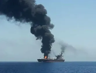 Crew abandons Greek-managed ship hit by unknown projectile near coast of Oman
