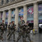 soldiers patrol outside gare du nord train station Paris