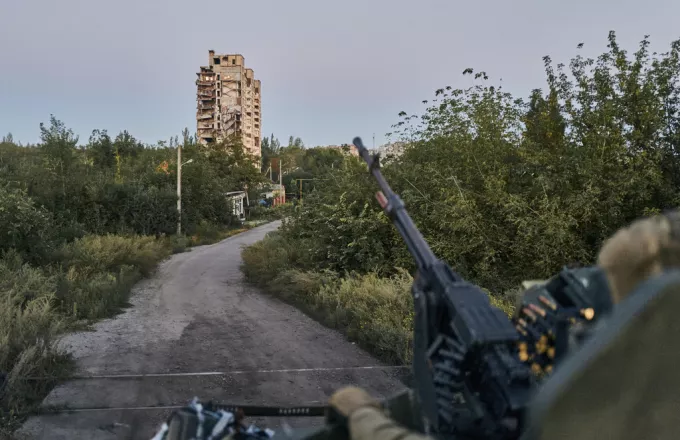 Ukrainian soldier sits in his position in Avdiivka