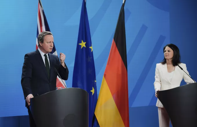 German Foreign Minister Annalena Baerbock, right, and her British counterpart David Cameron 