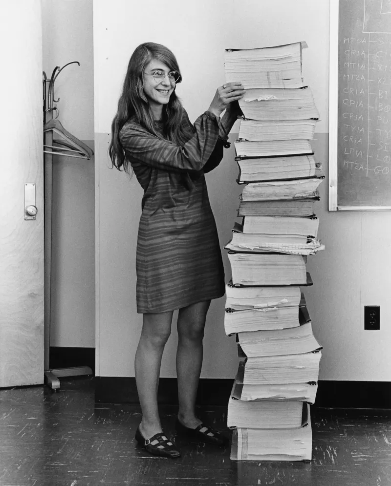 By Adam Cuerden - This is a retouched picture, which means that it has been digitally altered from its original version. Modifications: dust and scratches removed; curves tweaked to bring out shadows, approximately 3 pixels cropped from bottom in order to remove a border. See upload history of the PNG for version without colour tweaks. The&nbsp;original can be viewed here: Margaret Hamilton.gif:&nbsp;., Public Domain, https://commons.wikimedia.org/w/index.php?curid=59655977