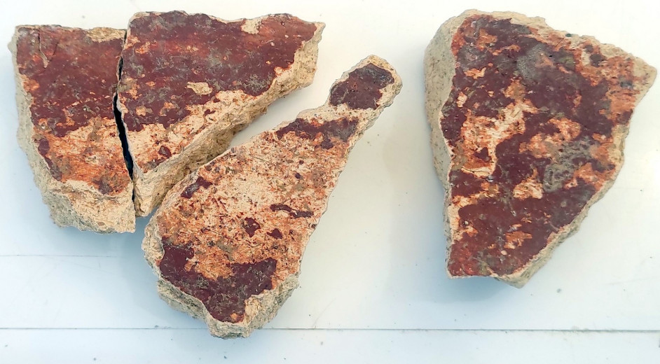 Fallen sections of mortar that preserve red color