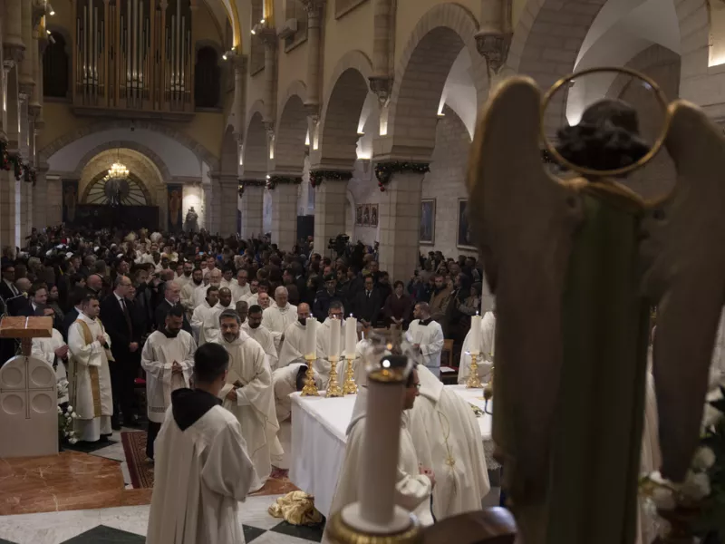Christmas midnight Mass at the Church of the Nativity compound, in the West Bank city of Bethlehem