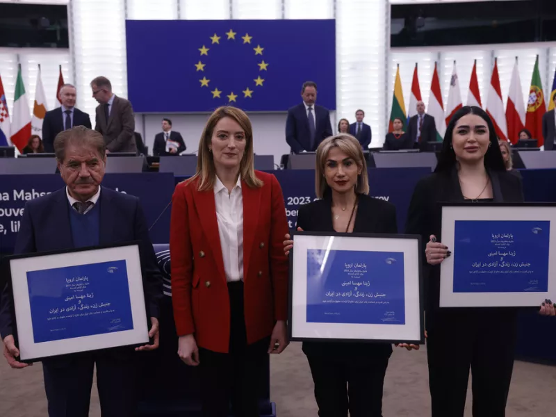 Iranian women's rights defenders Afsoon Najafi, right, Mersedeh Shahinkar, second right, Saleh Nikbakht, academic, lawyer representing Jina Mahsa Amini's family, left, and President of the European Parliament Roberta Metsola