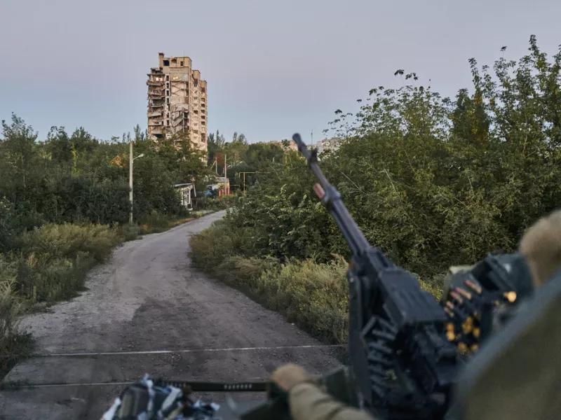 Ukrainian soldier sits in his position in Avdiivka