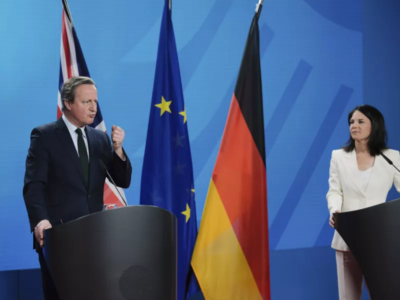 German Foreign Minister Annalena Baerbock, right, and her British counterpart David Cameron 